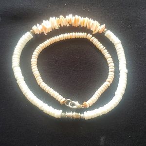 Two light colored beaded bracelet lot